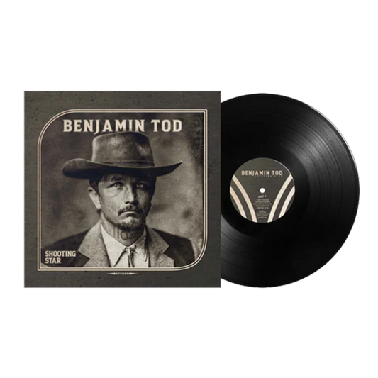 Vinyl record album shown with its sleeve and the black record partially pulled out. The cover features a sepia-toned portrait of 'BENJAMIN TOD' with text 'SHOOTING STAR'.