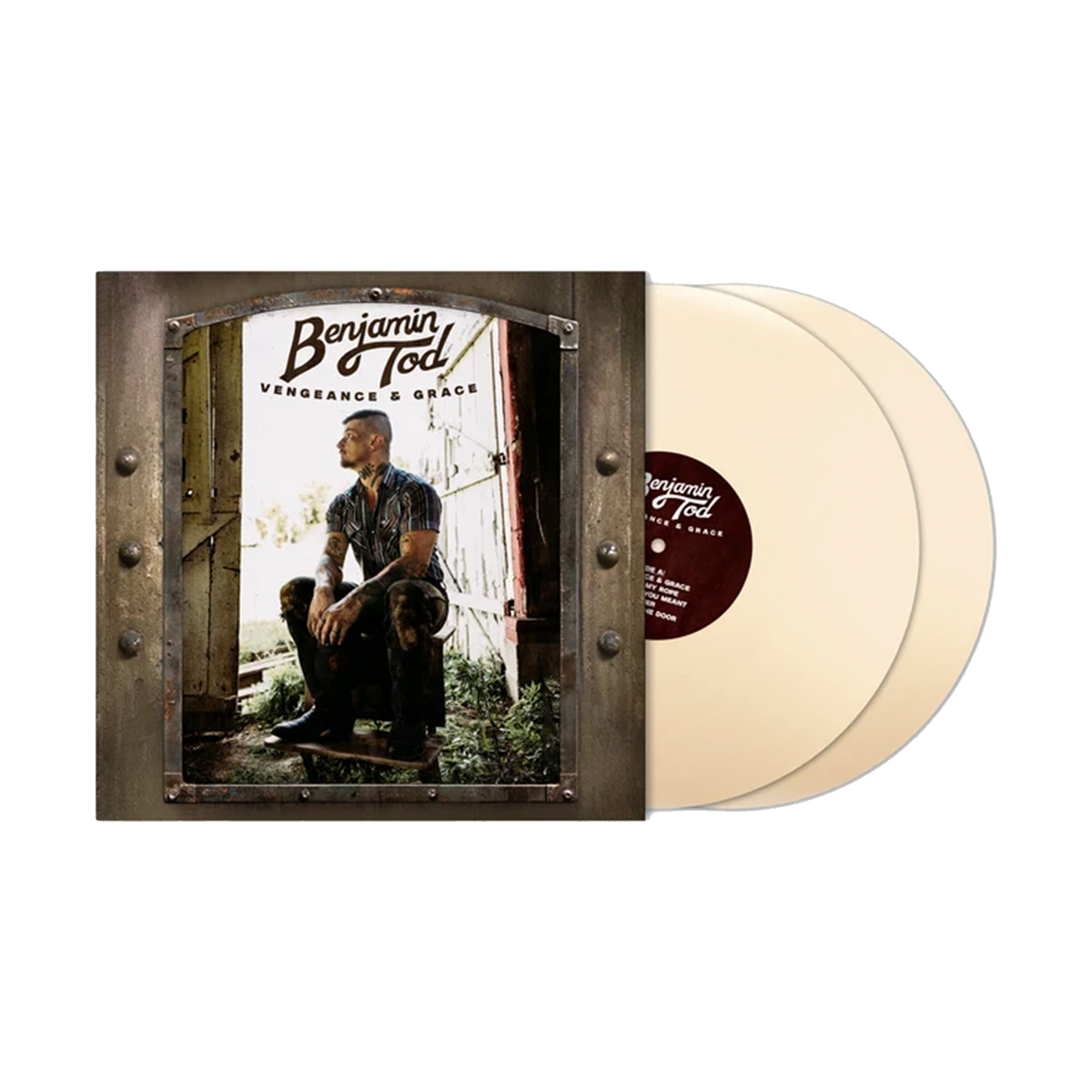 A vinyl record package, album cover with a printed photo of a man sitting in a doorway, next to two translucent cream-colored records. The cover text reads 'Benjamin Todd' and 'Vengeance & Grace'.