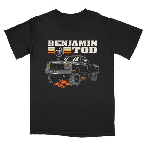 Truck graphic with Benjamin Tod text on the front of a black tee