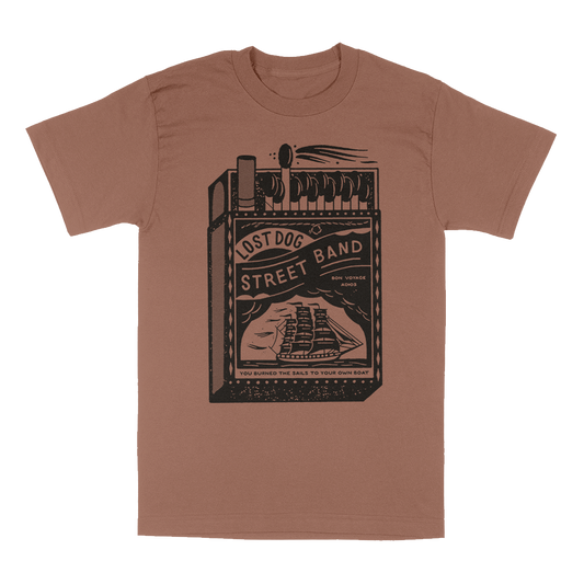Lost Dog Street Band Matchbox illustration on a light brown tee